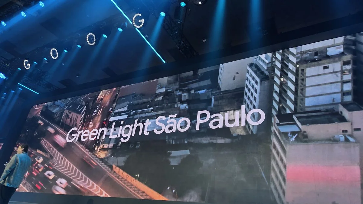 A high-tech urban traffic management dashboard featuring glowing abstract data visualizations and interconnected nodes representing city intersections. Intricate neon blue digital flows pulse across a dark grid, representing optimized vehic